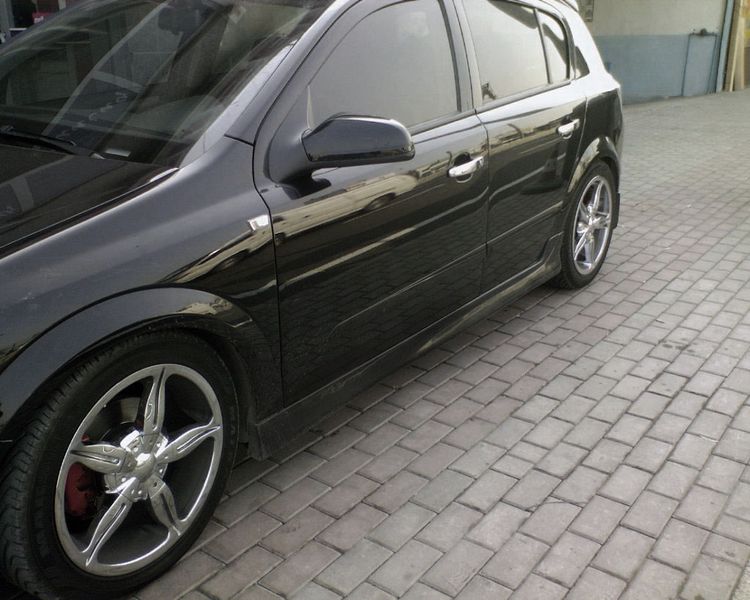 Бічні спідниці HB (під фарбування) для Opel Astra H 2004-2013рр 15477 фото